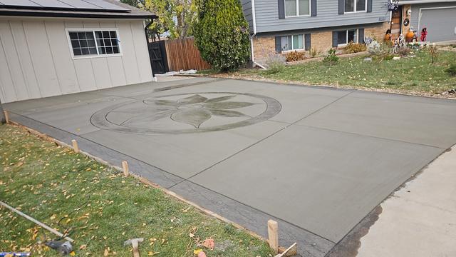 Driveway with a stamped compass medallion