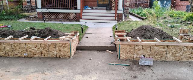 Wall forms in a front yard