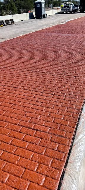Red brick-pattern stamped concrete