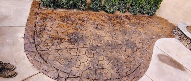 Stamped patio with a curved edge